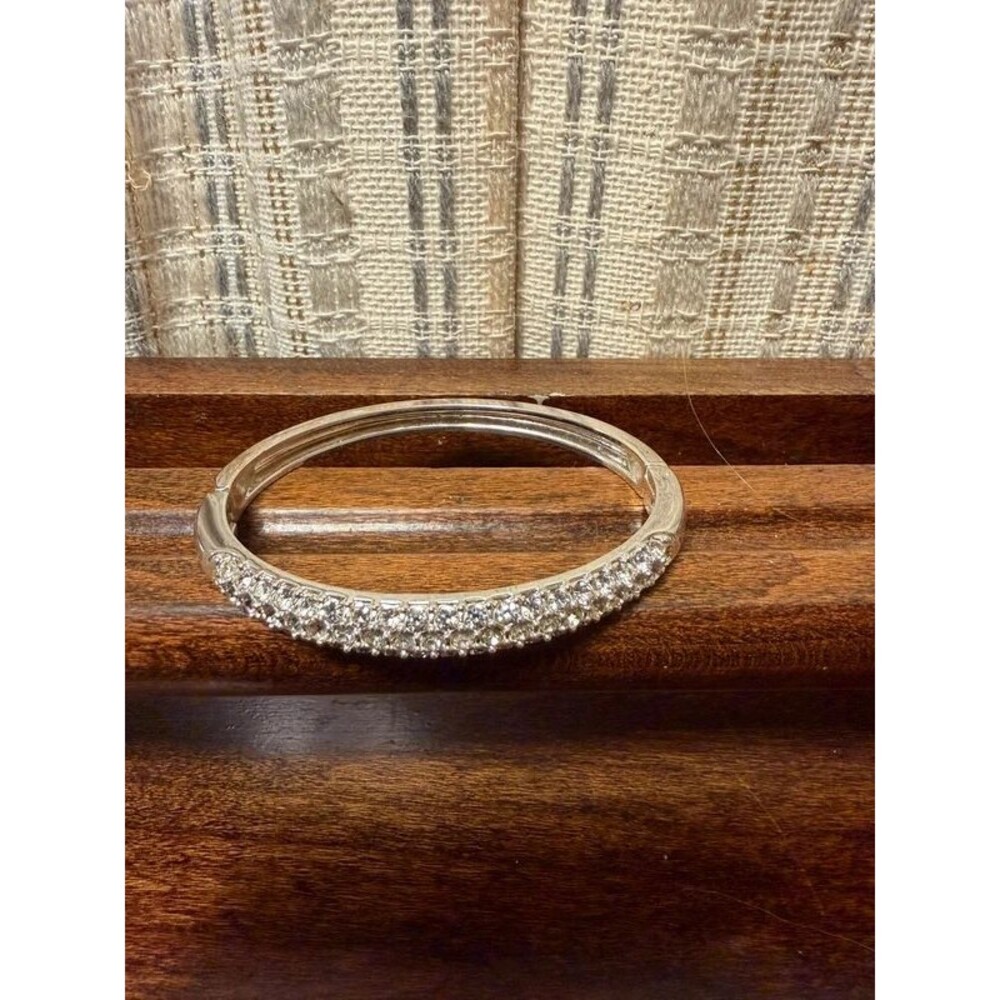 Silver tone cuff bracelet with rhinestones